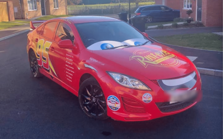 Lightning McQueen wrapped Mazda on Facebook Marketplace